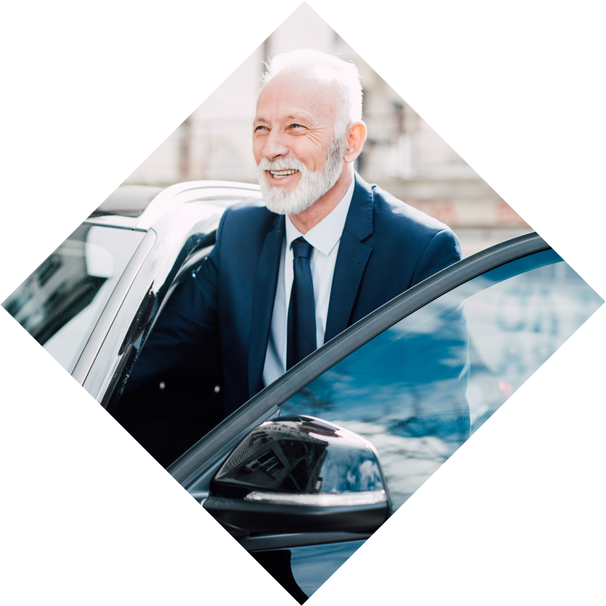 Man Getting Into Car
